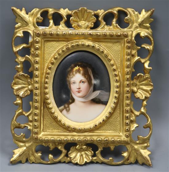 A porcelain oval portrait plaque, in gilt frame